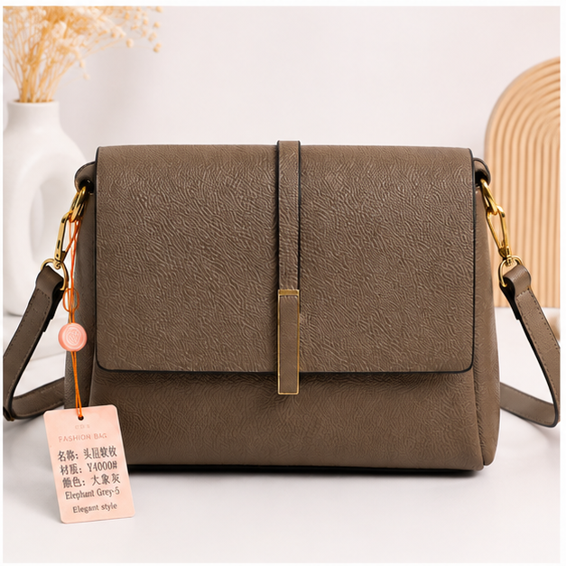 Elegant textured crossbody shoulder bag in Elephant Grey - front view